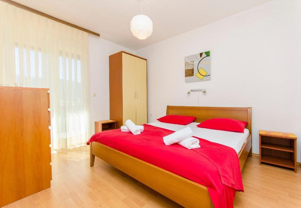 Katil atau katil-katil dalam bilik di Apartment Orco - close to the sea