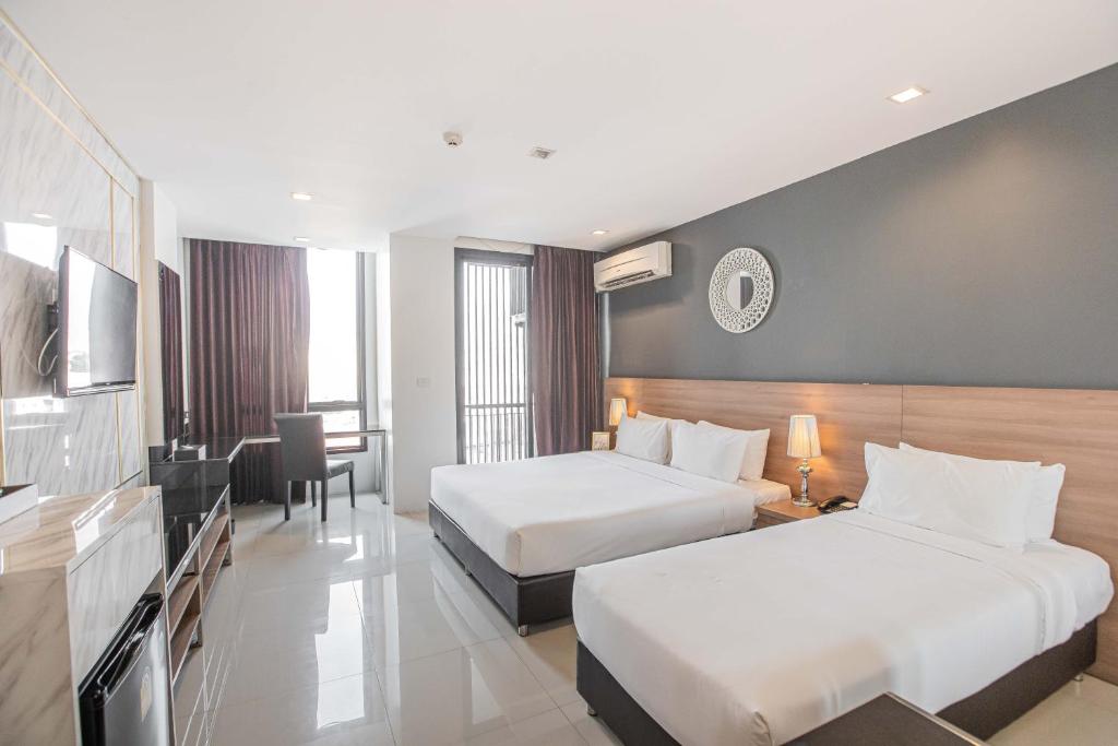 Marigold Sukhumvit - Free Shuttle to BTS Bearing Station - Executive Triple Room