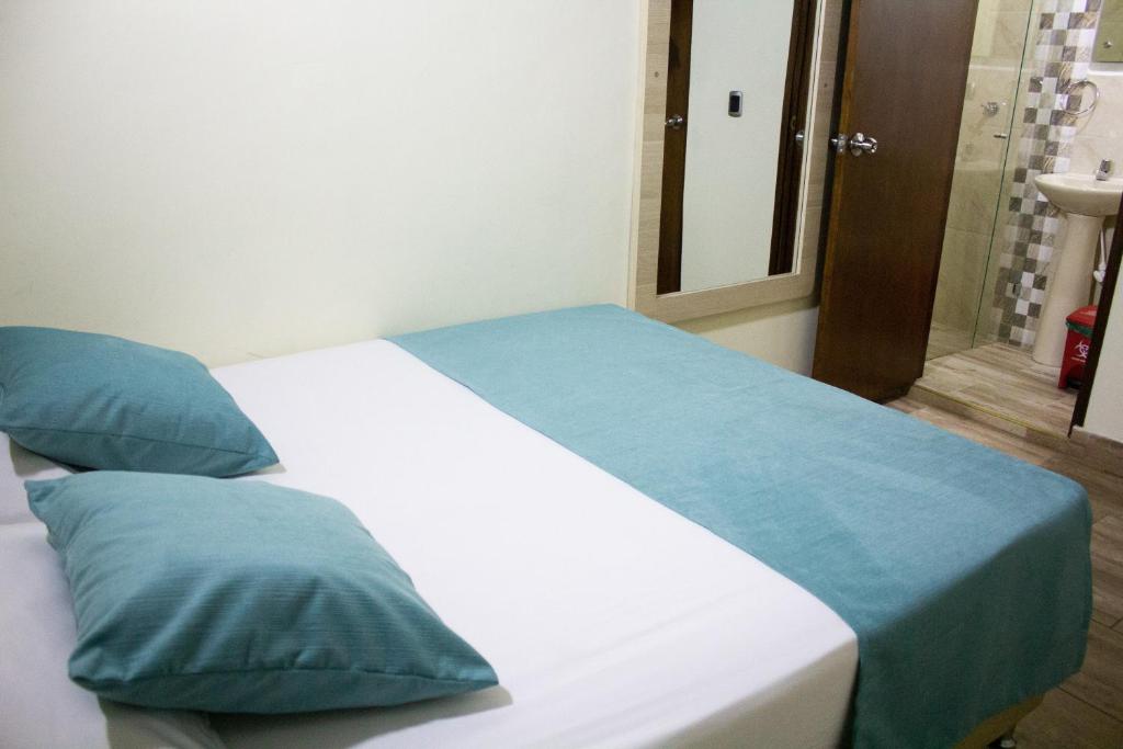 Postel nebo postele na pokoji v ubytování Hotel Boutique Street 50