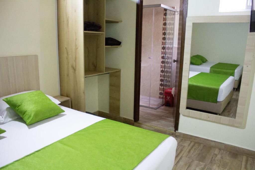 Postel nebo postele na pokoji v ubytování Hotel Boutique Street 50