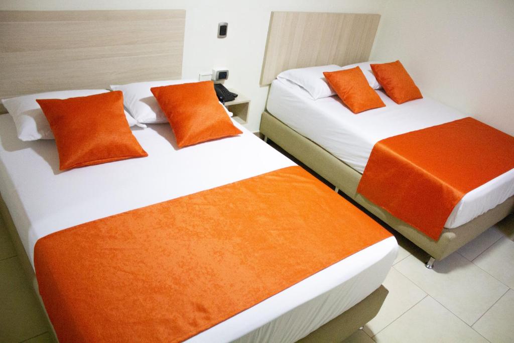 Postel nebo postele na pokoji v ubytování Hotel Boutique Street 50