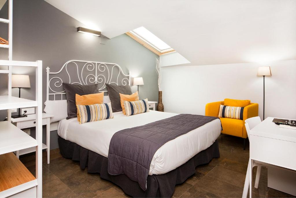 Postel nebo postele na pokoji v ubytování HOTEL SANT PERE ll HSPII