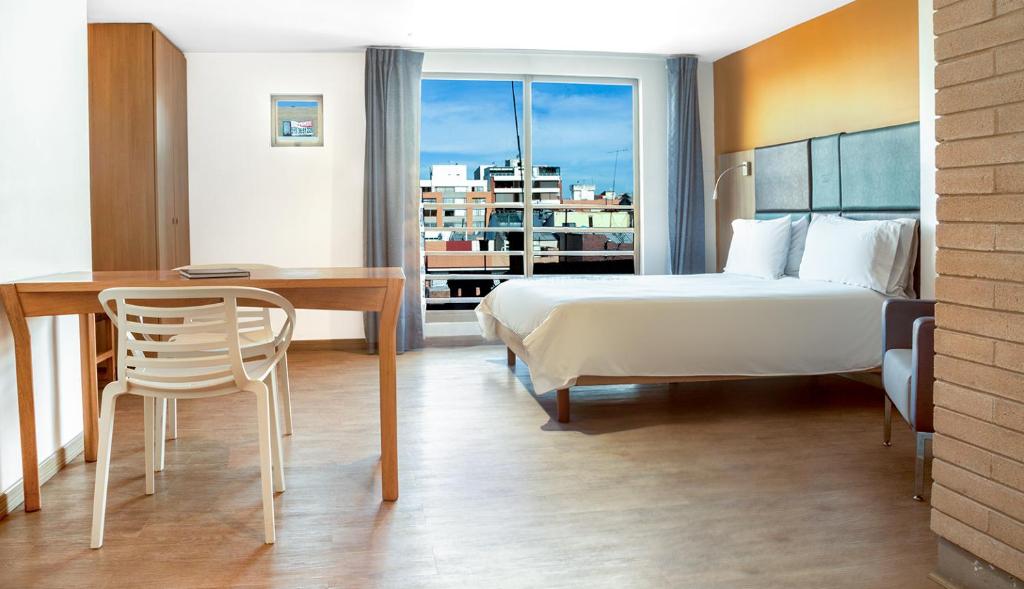 Postel nebo postele na pokoji v ubytování Hotel Viaggio Teleport City Suites