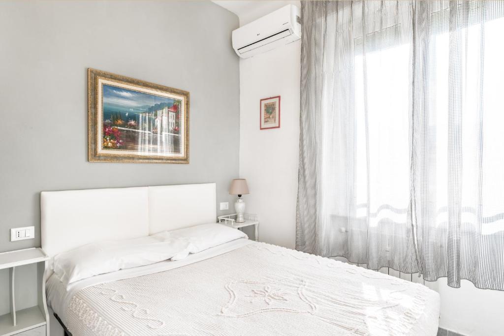 Postel nebo postele na pokoji v ubytování Lia Rooms 2