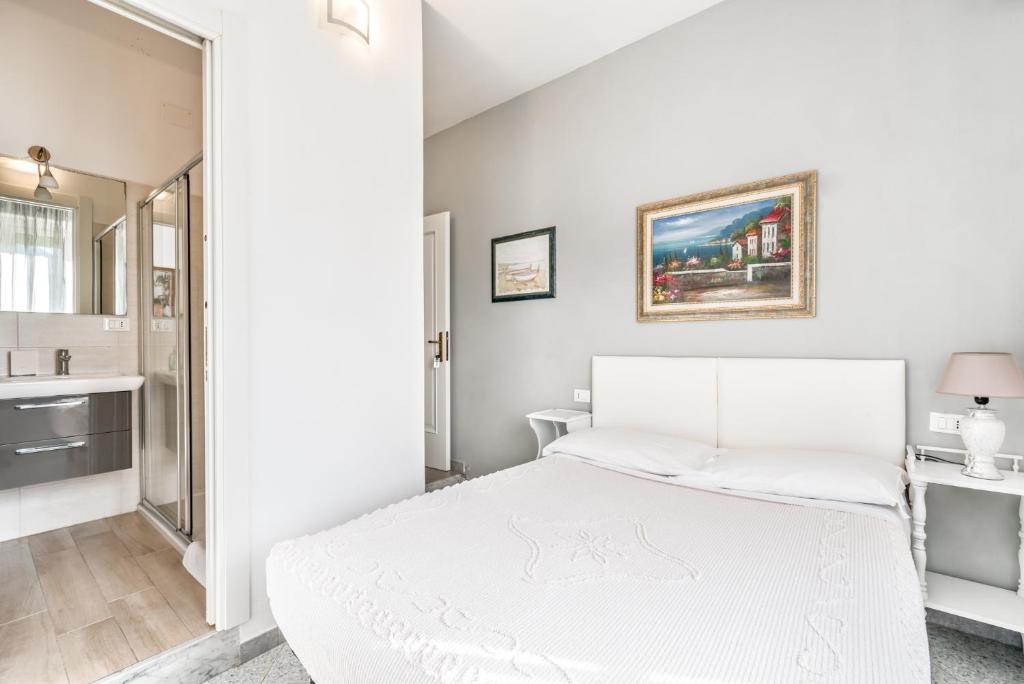 Postel nebo postele na pokoji v ubytování Lia Rooms 2