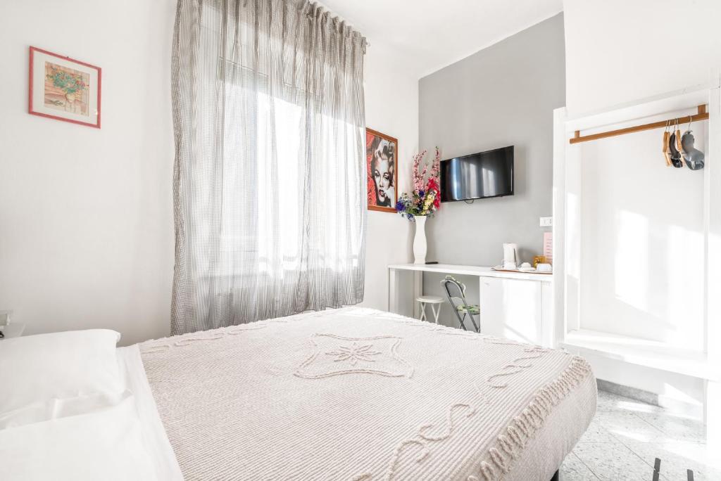 Postel nebo postele na pokoji v ubytování Lia Rooms 2