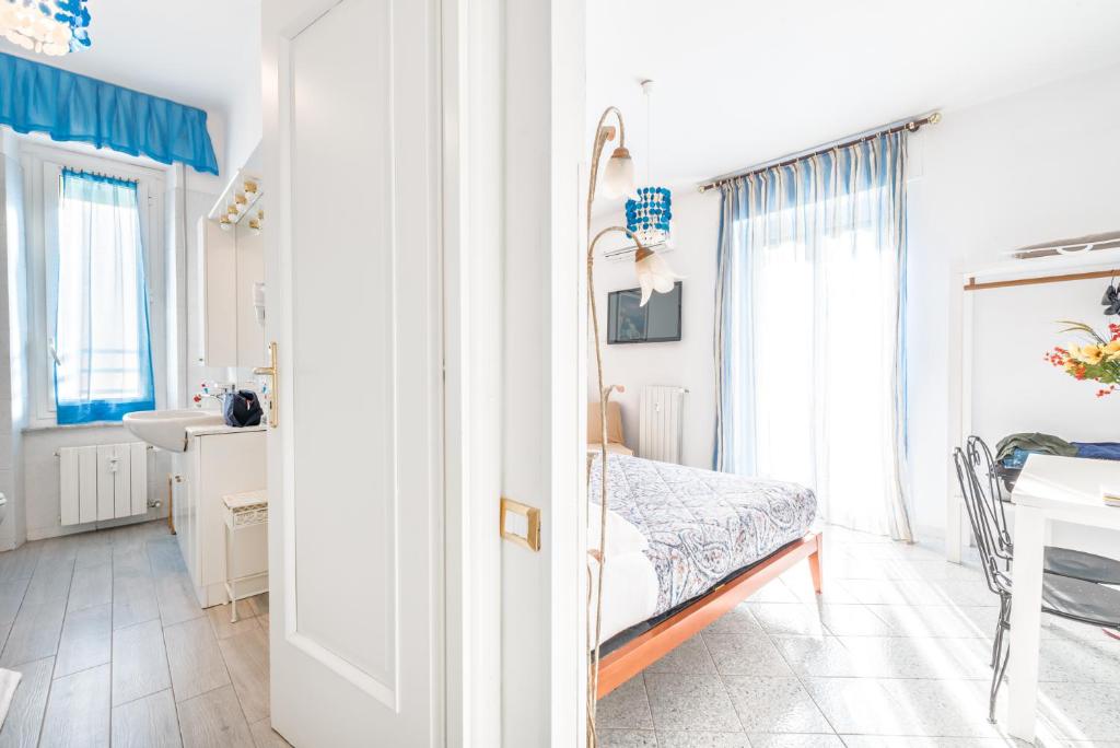 Postel nebo postele na pokoji v ubytování Lia Rooms 2