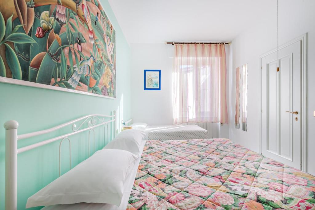 Postel nebo postele na pokoji v ubytování Lia Rooms 2