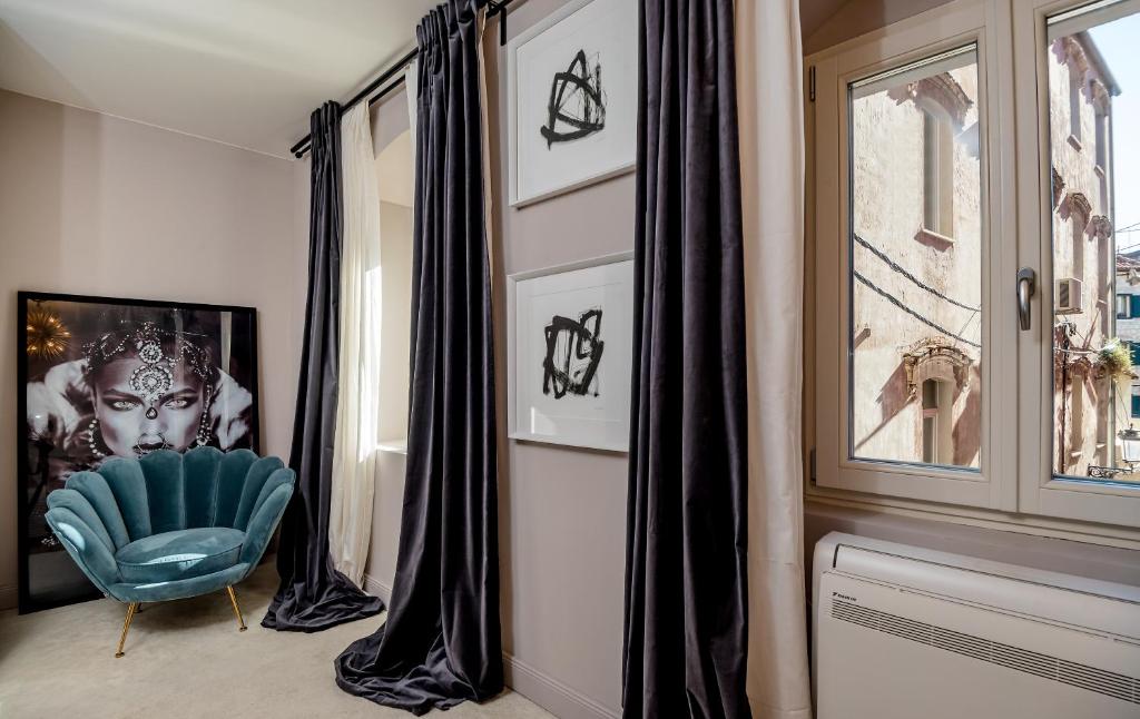 Posezení v ubytování ARTALE 07 Design Rooms