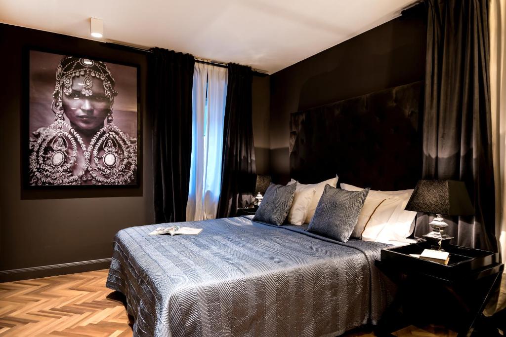 Postel nebo postele na pokoji v ubytování ARTALE 07 Design Rooms