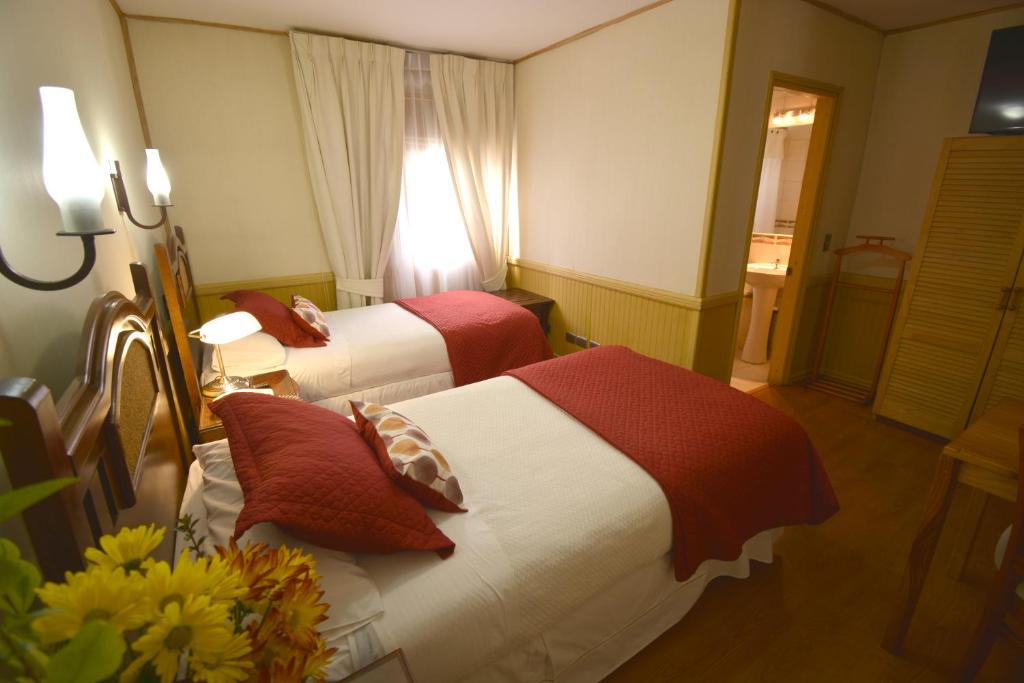 Postel nebo postele na pokoji v ubytování Hotel Di Torlaschi