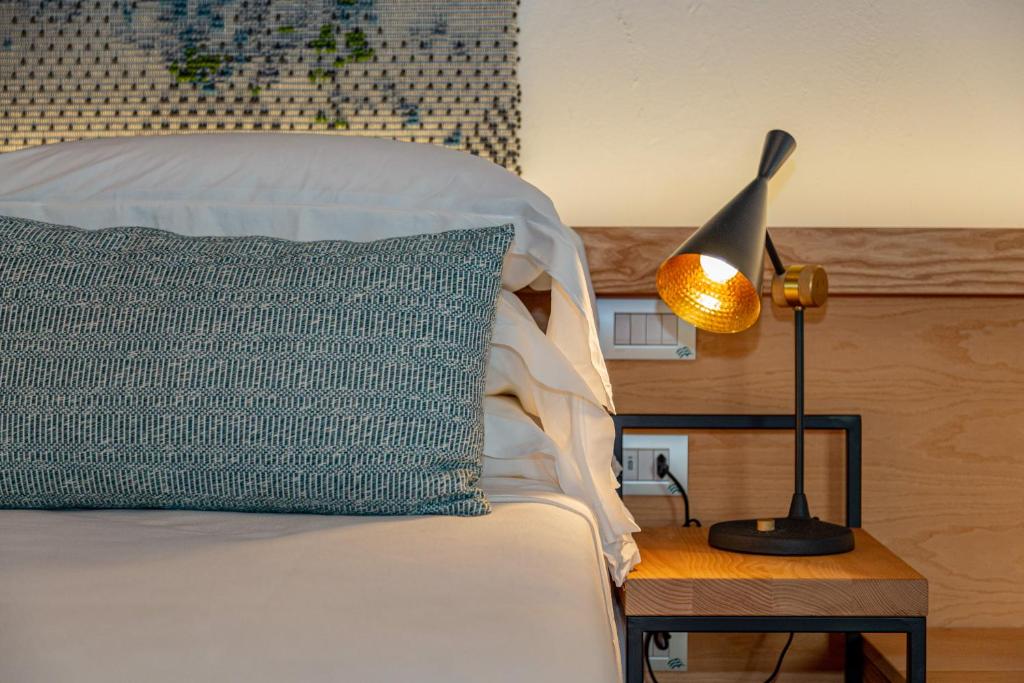 Posteľ alebo postele v izbe v ubytovaní Hotel Sporting