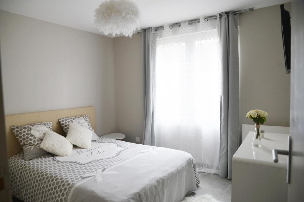 Ένα ή περισσότερα κρεβάτια σε δωμάτιο στο sweet In apartment