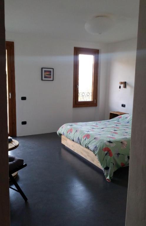 Postel nebo postele na pokoji v ubytování B&B Val Valerna