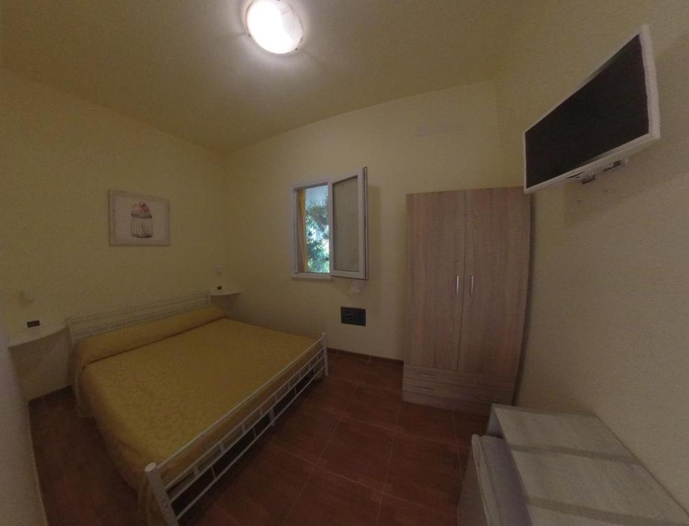 Postel nebo postele na pokoji v ubytování Villa Terra Nostra