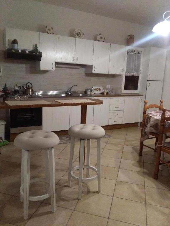 Kuchyň nebo kuchyňský kout v ubytování Ai tre archi di Tagliaborse