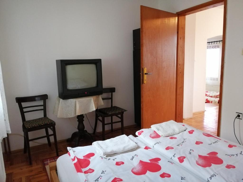 Postel nebo postele na pokoji v ubytování Pansion Velickovic