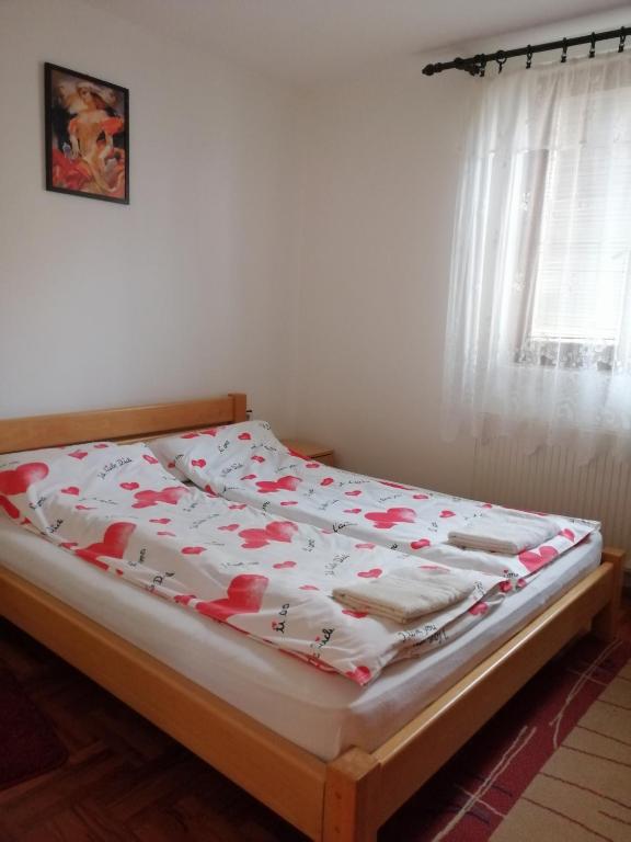 Postel nebo postele na pokoji v ubytování Pansion Velickovic