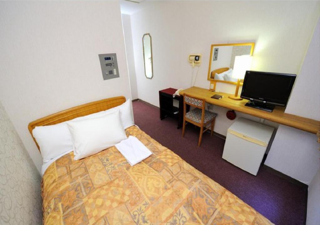 Postel nebo postele na pokoji v ubytování Hotel Royal Garden Kisarazu / Vacation STAY 71705