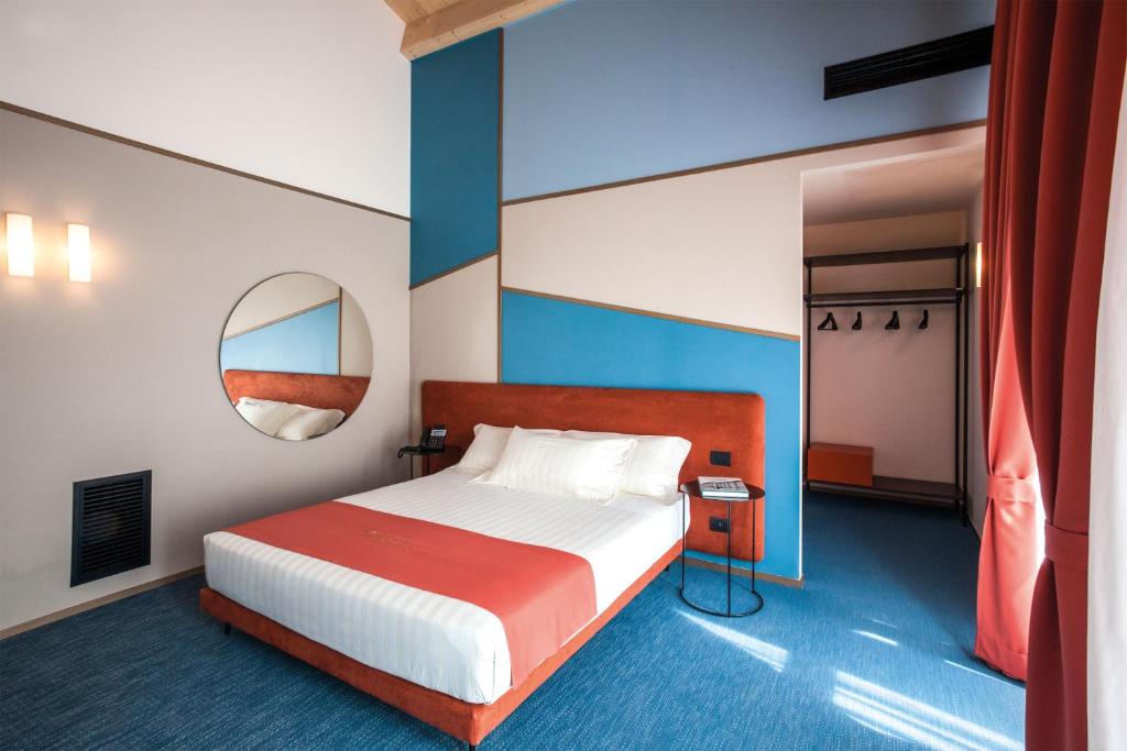 Postel nebo postele na pokoji v ubytování Best Western Plus Dimora del Monaco