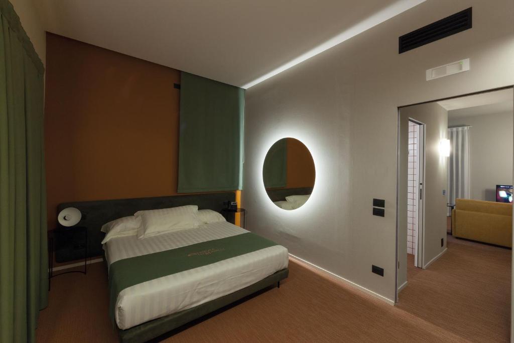 Postel nebo postele na pokoji v ubytování Best Western Plus Dimora del Monaco