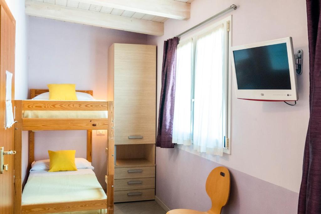 Postel nebo postele na pokoji v ubytování Hotel Mary Fleur