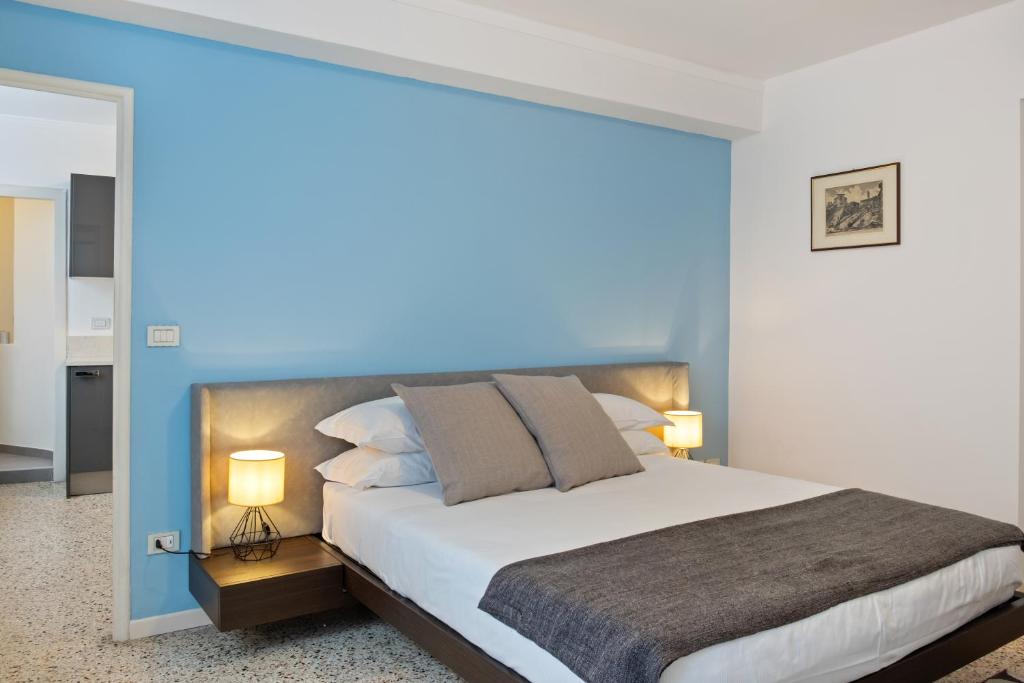 Postel nebo postele na pokoji v ubytování Italianflat - Verona Suite