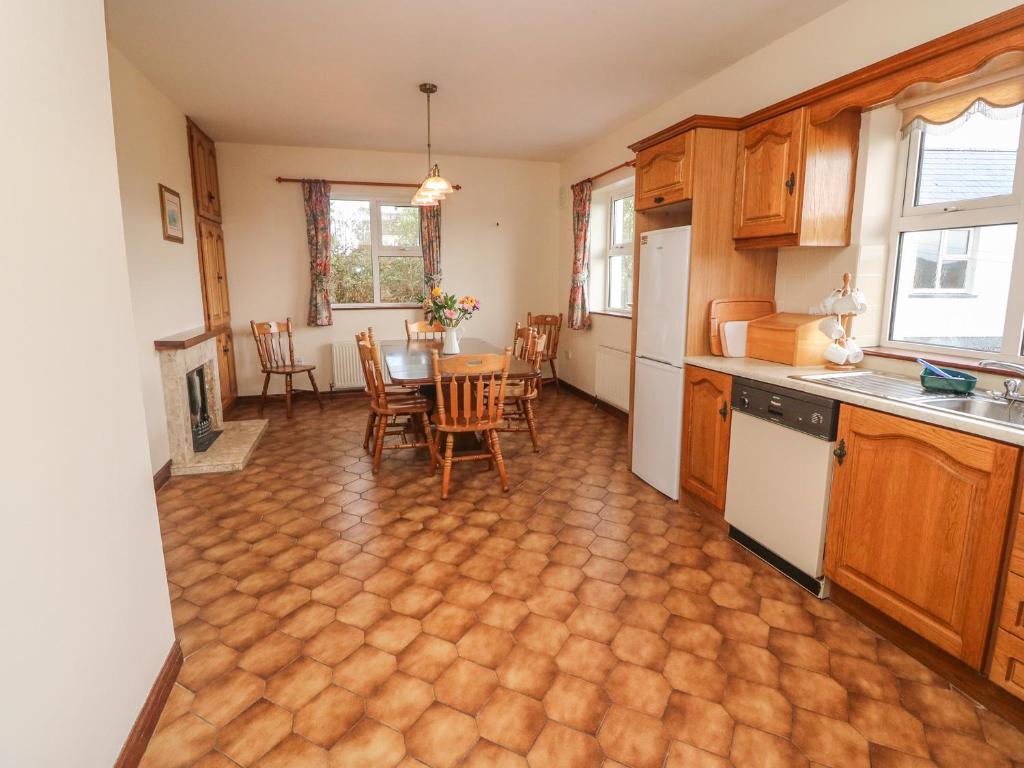 Kuchyň nebo kuchyňský kout v ubytování Cleary Cottage