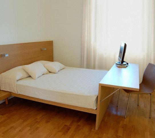 Postel nebo postele na pokoji v ubytování Acquarello