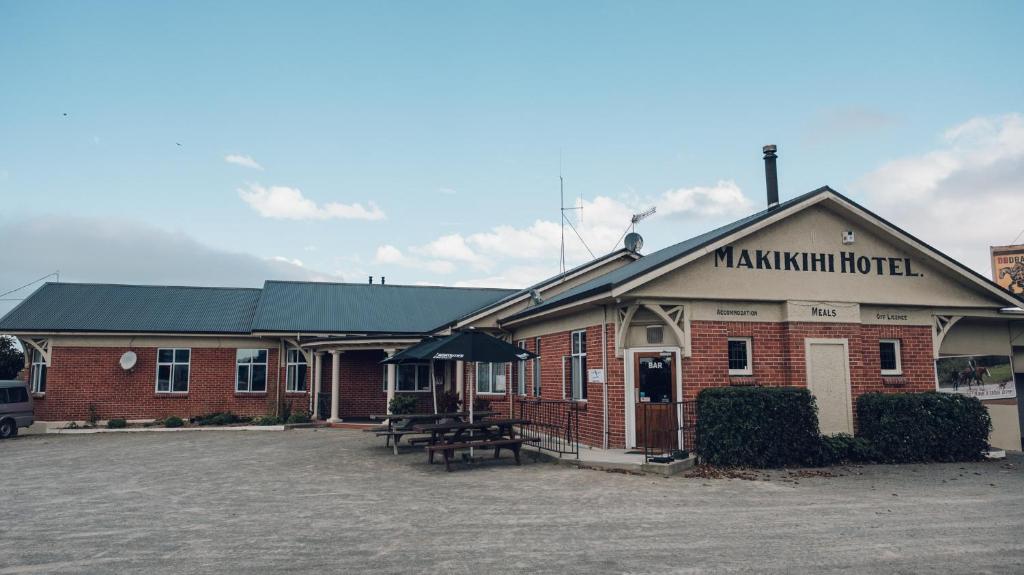 a building with a sign that reads mammoth hotel at Makikihi Country Hotel in Waimate