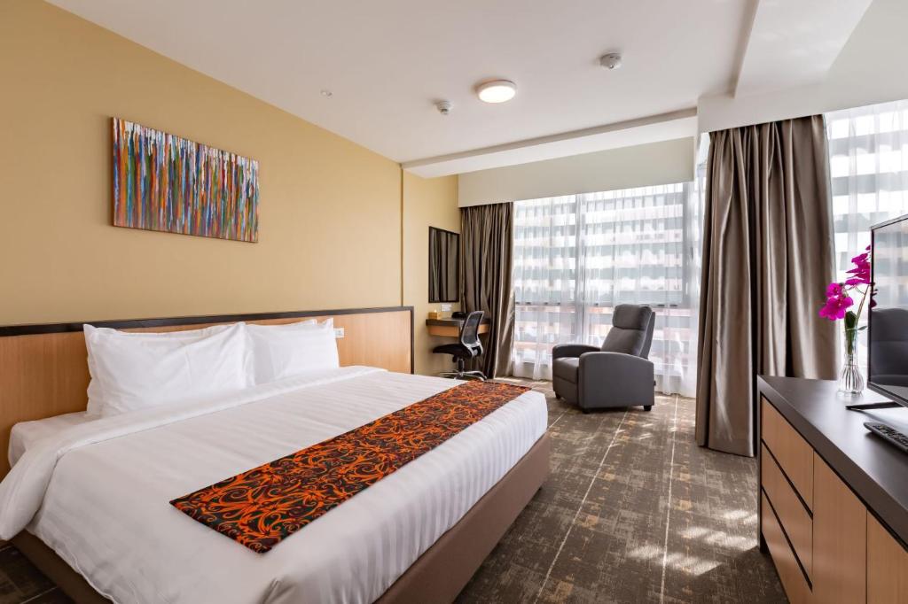 Postel nebo postele na pokoji v ubytování Hotel 7 Suria
