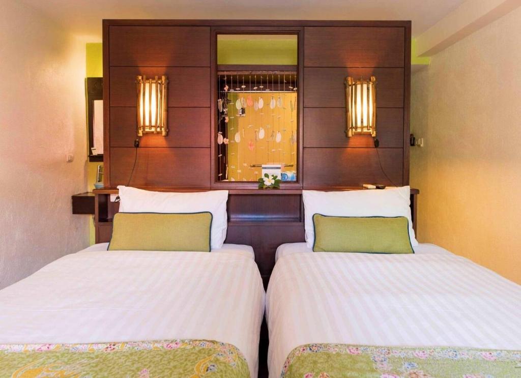 Postel nebo postele na pokoji v ubytování Vacation Village Phra Nang Inn - SHA Extra Plus