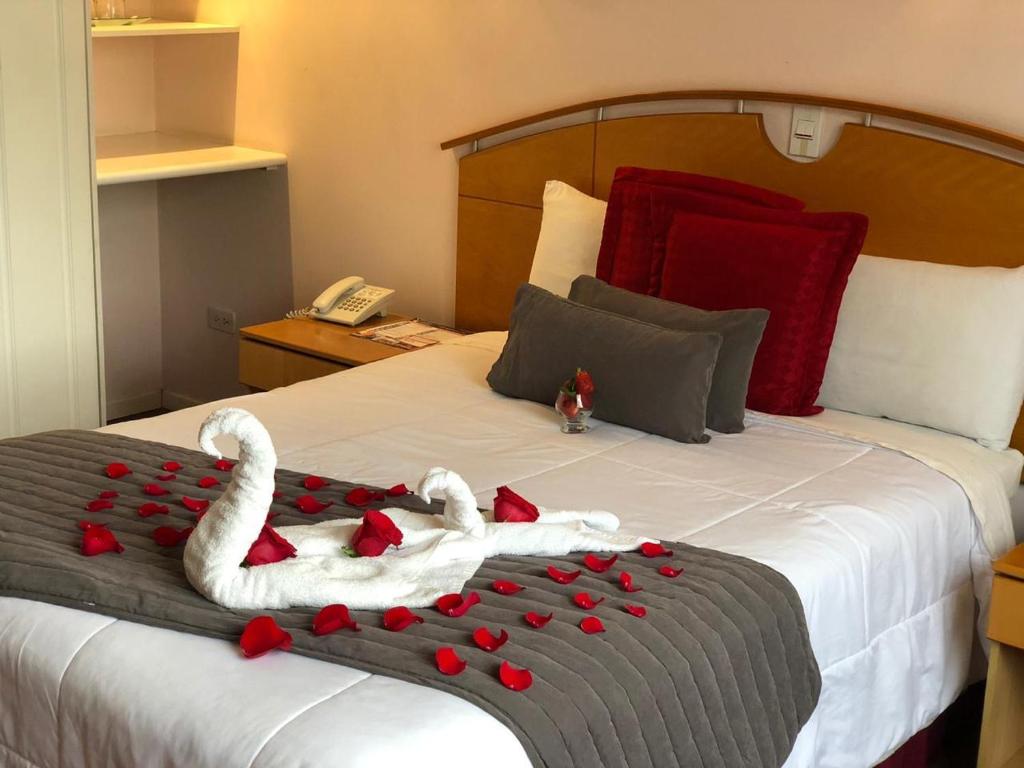 Postel nebo postele na pokoji v ubytování Hostal de La Mancha