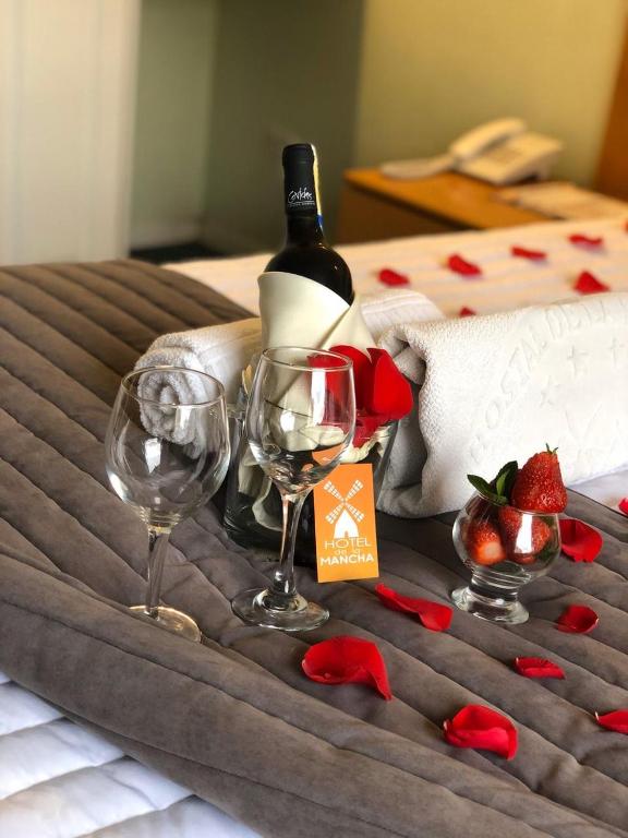 Postel nebo postele na pokoji v ubytování Hostal de La Mancha