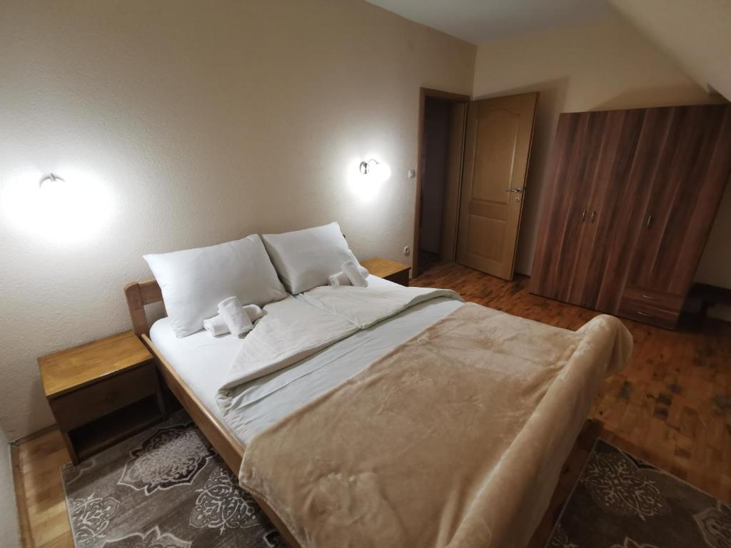 Postel nebo postele na pokoji v ubytování Hotel Gacka