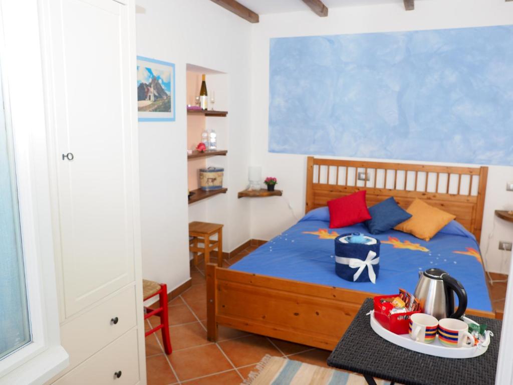 Postel nebo postele na pokoji v ubytování Pietra Di Mare