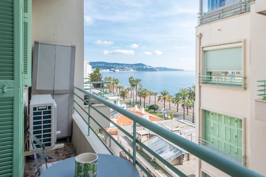 a balcony with a view of the ocean at La Suite 111 in Nice