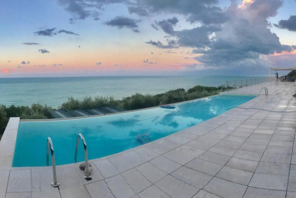 The swimming pool at or close to Stunning Design Villa with unique 180º sea views