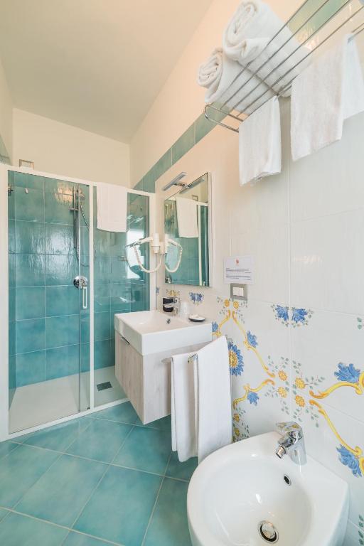 Koupelna v ubytování Hotel Corallo Circeo