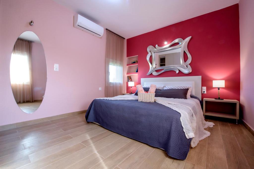 Postel nebo postele na pokoji v ubytování Gouves Garden Hersonisos Heraklion