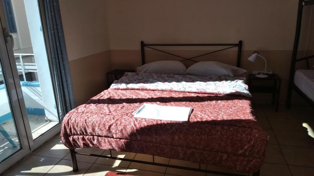 Postel nebo postele na pokoji v ubytování SAN REMO HOSTEL