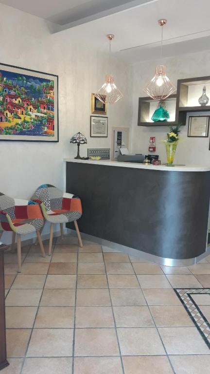 Kuchyň nebo kuchyňský kout v ubytování Hotel Cinzia