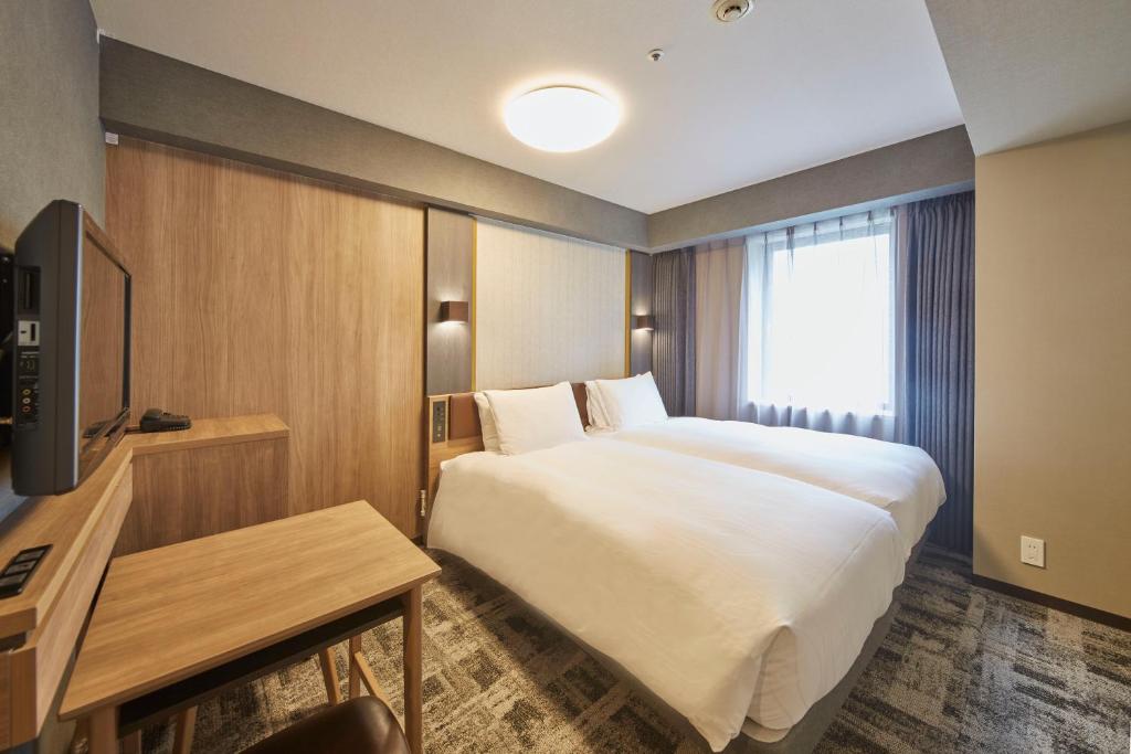 TV a/nebo společenská místnost v ubytování Richmond Hotel Narita