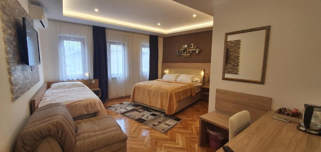 Postel nebo postele na pokoji v ubytování Villa Cardak