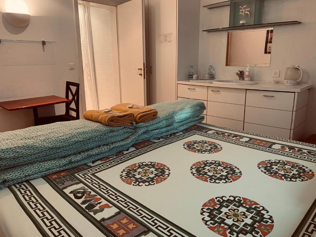 Letto o letti in una camera di Swiss Dewa
