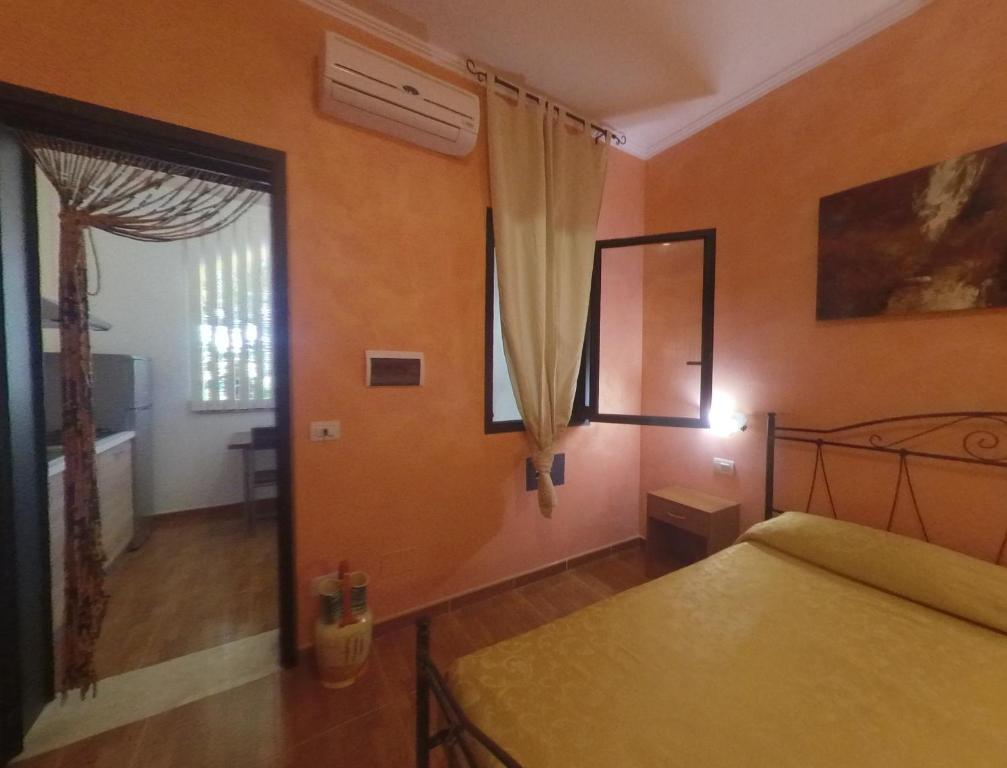 Postel nebo postele na pokoji v ubytování Villa Terra Nostra