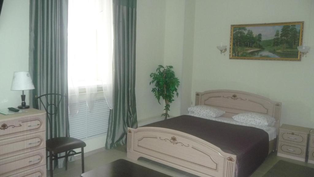 En eller flere senge i et værelse på Vishnevyj Sad