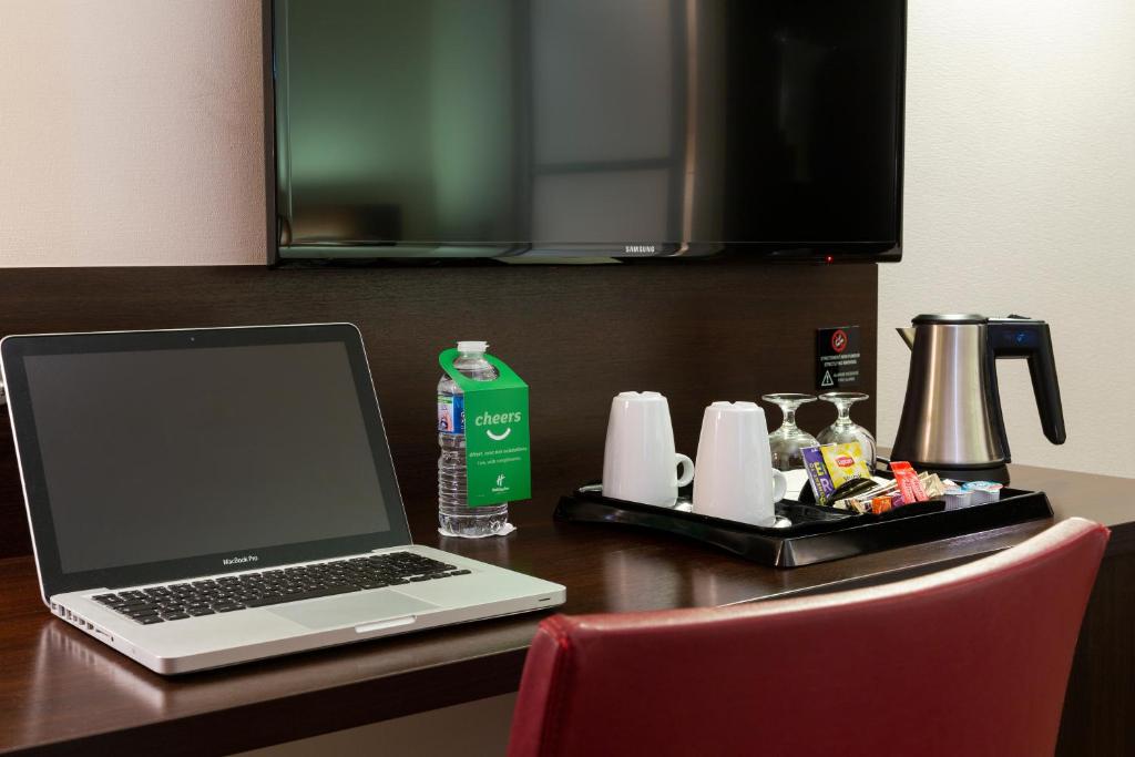 TV a/nebo společenská místnost v ubytování Holiday Inn - Strasbourg - Nord by IHG