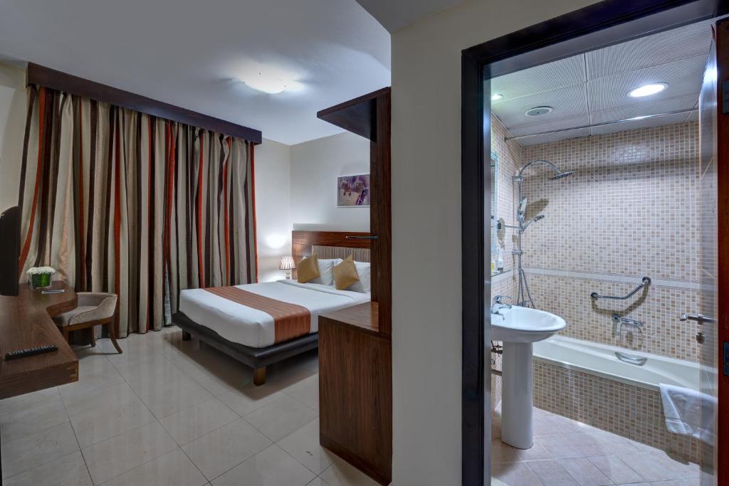 Koupelna v ubytování Aryana Hotel