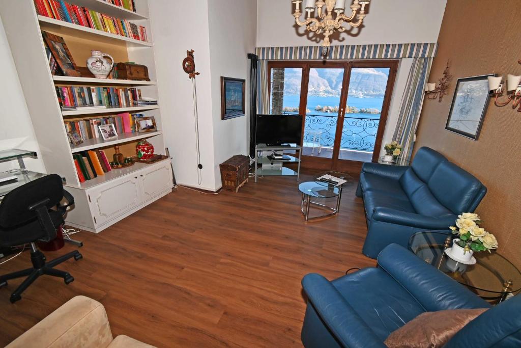 TV a/nebo společenská místnost v ubytování Casa Ariane